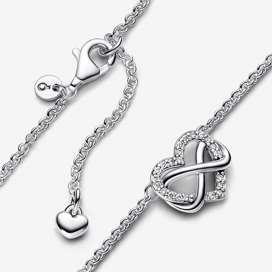 Collier scintillant avec cœur et symbole d’infini