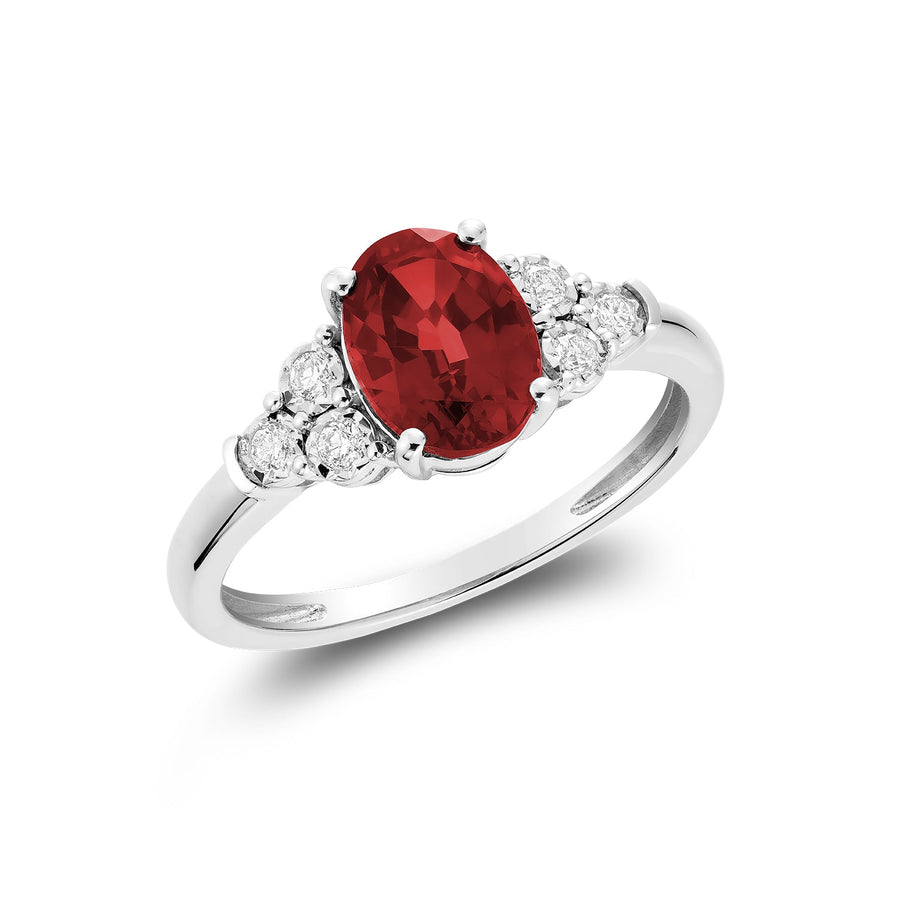 Oval Created Gemstone and Diamond Ring